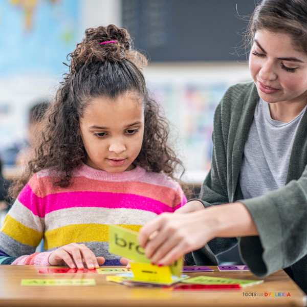 Image of a coach, as in a teacher helping a student for the structured word inquiry post about coach