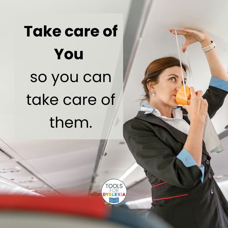 Fears about Dyslexia image of airline stewardess putting on an oxygen mask
